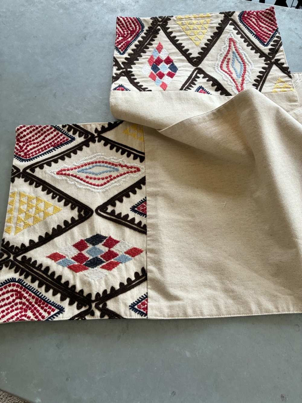 Embroidered Diamond Pattern Table Runner - Cream with Red, Blue & Yellow Accents